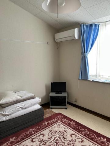 Petit Hotel Koizumi Toyako Buitenkant foto